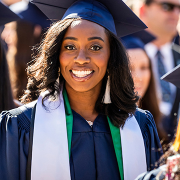 A smiling graduate