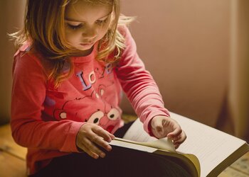 girl reading a book