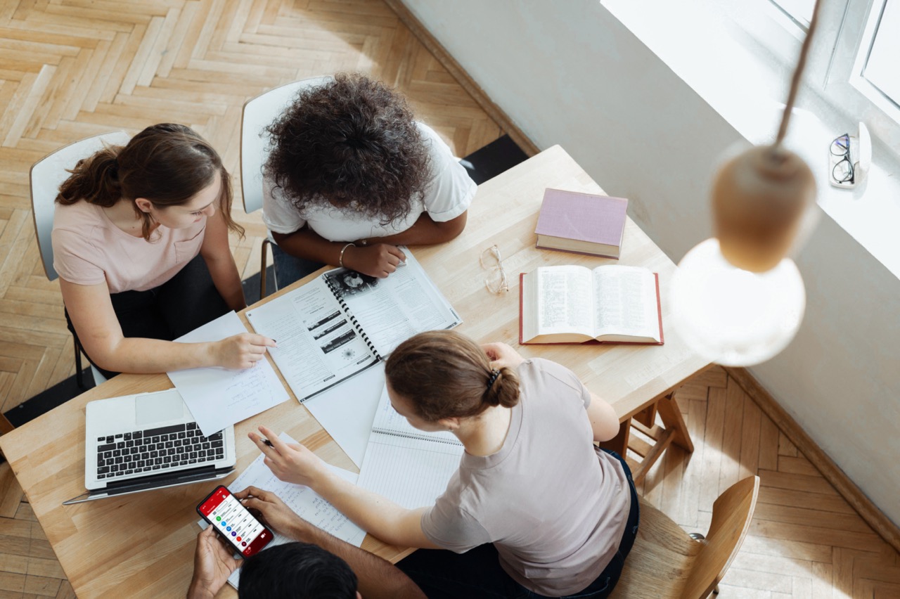 group of people working at table