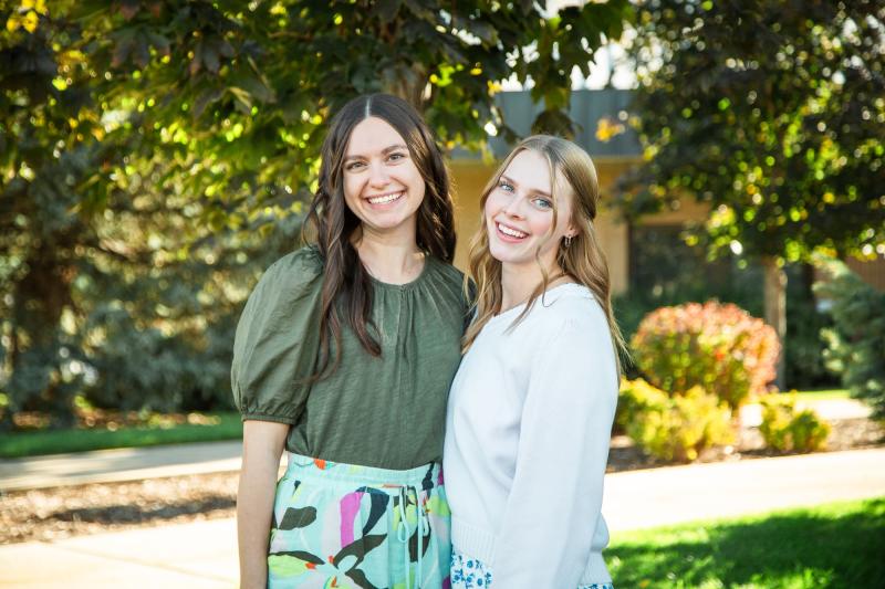 Two women on the peer mentorship team.